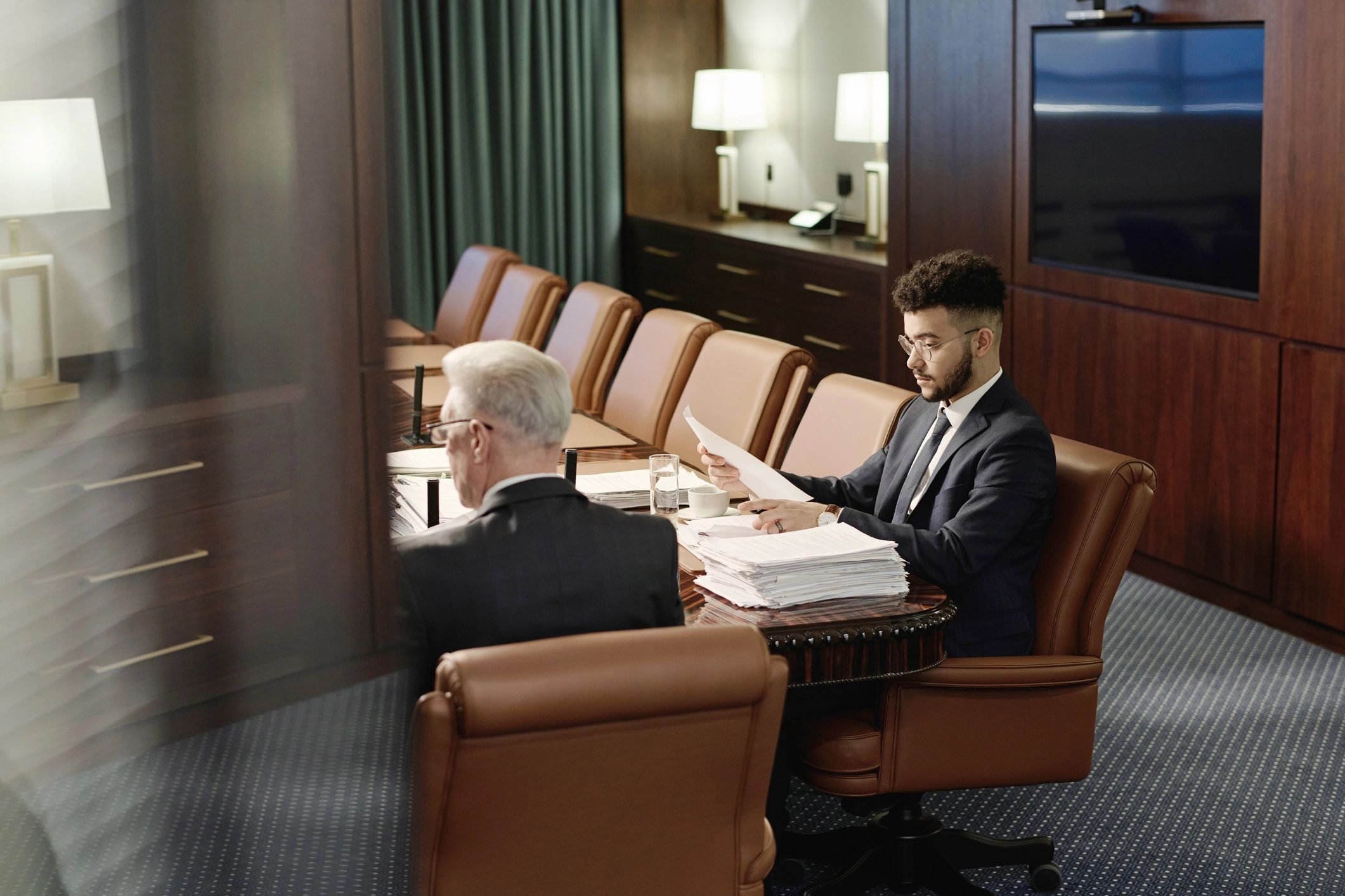 Attorney reviewing documents at a desk